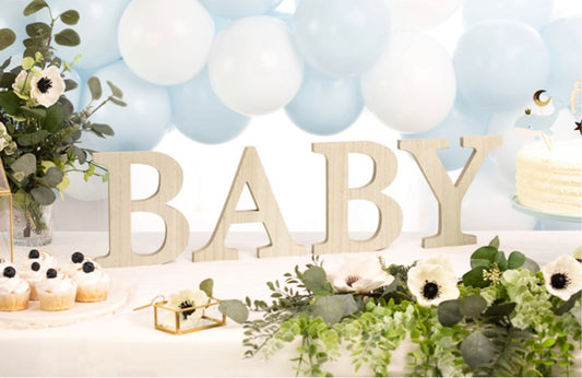 Wooden letters "BABY" to stand up